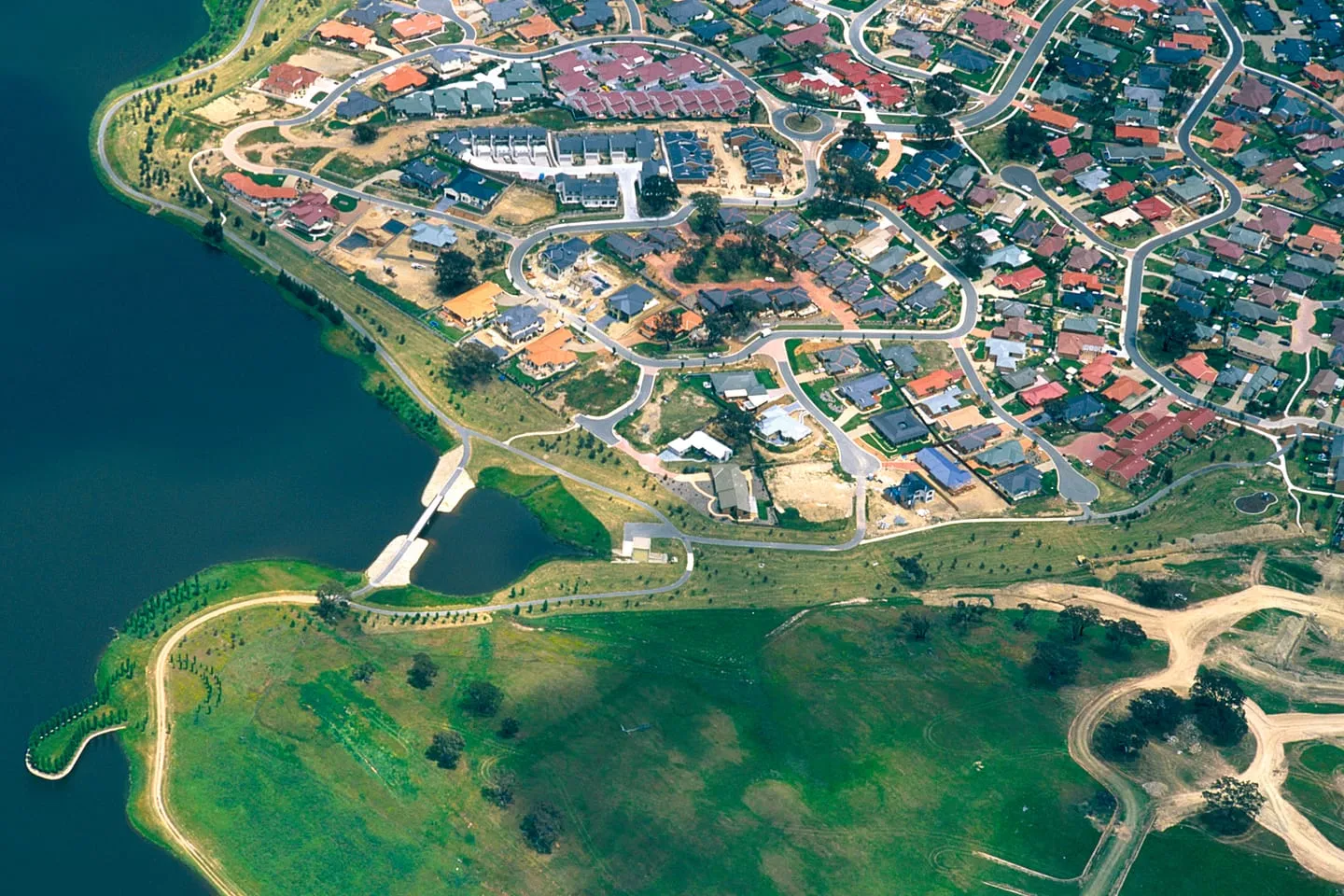 Mortgage broker Canberra: aerial view over new housing in a Canberra suburb